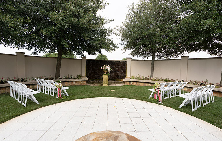 view of a wedding setup in the meditation garden
